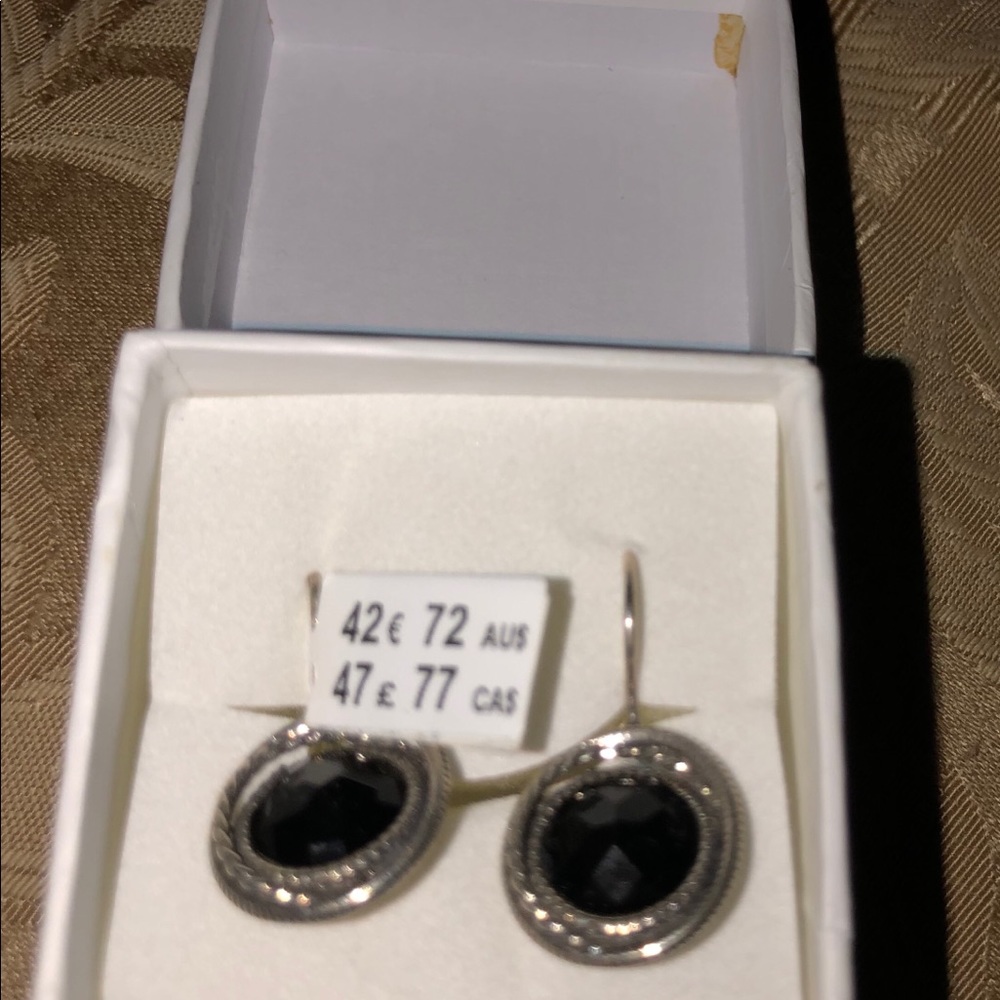 Silver drop earrings.   Brand new.  Very pretty